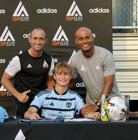 Sutton Williams with Joan Oliva and Alfi Conti at his SKC Signing Ceremony